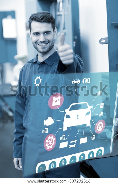 Engineering interface against mechanic smiling at\
the camera
