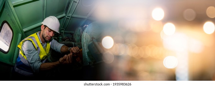 Engineering man using wrench in a factory machine room, double exposure with bokeh, banner cover.	 - Shutterstock ID 1935983626
