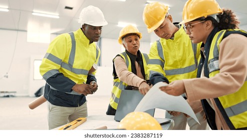 Engineering, people planning and teamwork with blueprint, construction site and building design in warehouse. Industrial group talking of floor plan, project management and architecture documents - Powered by Shutterstock