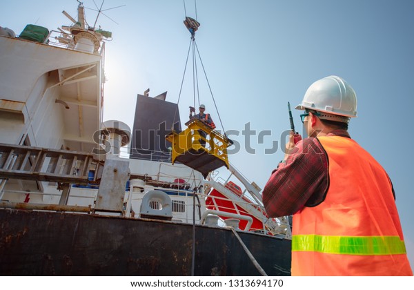 engineering port control or harbor\
master in communication to the crane driver for taking care of the\
lifting operation against human at risk in transfering\
basket