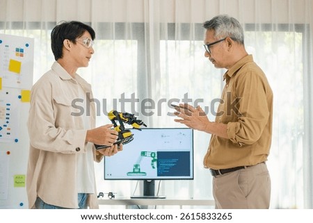  engineering robot technology with asian programmer innovation and research teamwork in coding development