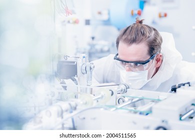 Engineering Scientist Working With Advanced Technology Medical Device In Science Laboratory For Experimental Research.