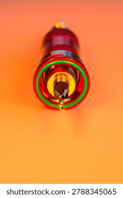 Engineering Series : Close up of a pilot drill with countersink bit set in a quick release holder under vibrant RGB lighting. This industrial tool showcases mechanical innovation, precise woodworking engineering and the beauty of human ingenuity.