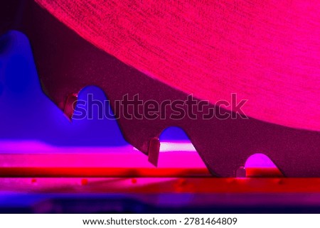 Engineering Series : A high precision miter saw blade showcases the evolution of woodworking technology through neon lit carbide tipped teeth. This industrial masterpiece blends abstract art with engineering ingenuity representing the sophisticated craftsmanship required for intricate furniture manufacturing and cross cutting excellence.