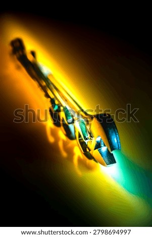 Engineering Series : Various sizes of professional steel wrenches arranged on a dramatic dark background. This conceptual composition symbolizes unity in diversity and the evolution of mechanical tools. It artistically highlights human ingenuity in industrial innovation and tactical engineering.