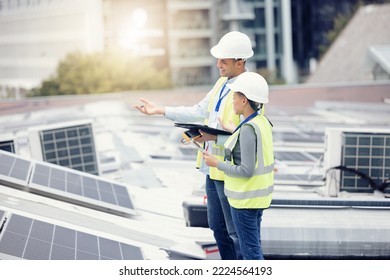 Engineering, Solar Panels And Team Planning A Maintenance Project Outdoor In The City On A Rooftop. Solar Energy, Eco Friendly And Industrial Workers In Collaboration Working On Photovoltaic Cells.