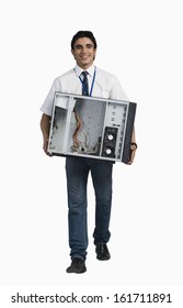 Engineering Student Carrying A Computer Cabinet