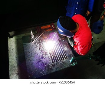 Engineering Student Perform Arc Welding