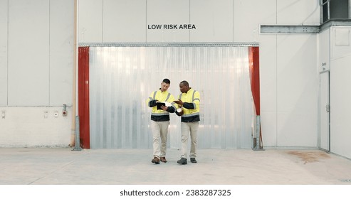 Engineering, tablet and communication in warehouse for teamwork, collaboration on construction floor plan. Diversity, professional men or people for building design, factory and project management