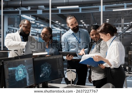 Engineering team working together in data center with artificial intelligence neural networks tech. Server farm staff members cooperating, using AI programming language to update equipment
