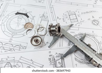 Engineering and technology. Engineering drawing, Measuring instrument - Vernier caliper and parts are steel sleeves. The set of elements reflecting the concept of engineering. Or technical progress.
