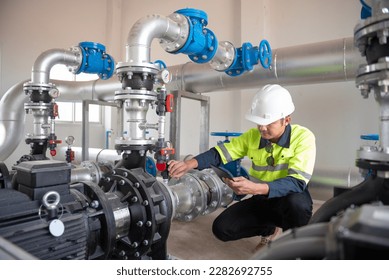 Engineering, water pressure adjustment, industry, workers, water treatment station - Powered by Shutterstock