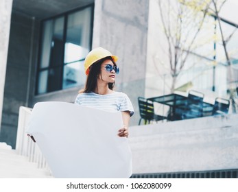 Engineering woman working at building site. - Powered by Shutterstock