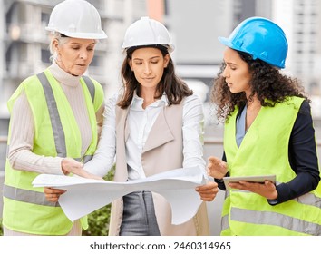 Engineering, women or blueprint for construction site, teamwork or architecture with conversation. Group, staff or leader with employees, documents or floor plan with contractor, review or industrial - Powered by Shutterstock