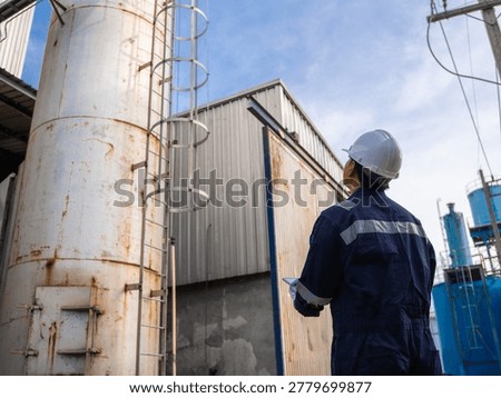 Engineering work using digital tablet maintenance Exhaust system concept Clean air environmental protection. Factory industrial manufacturing. Sustainable future environment air pollution reduction
