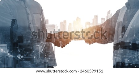 Engineering worker industry double exposure city teamwork concept, handshake uniting working as a team builder, contractor technician, architect co workers using blueprint plan, background blue banner