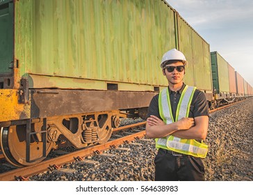 Engineering working  in front of cargo loading workplace, Freight train