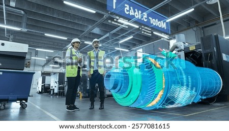 Engineers Analyze Data in a Smart Factory Using Augmented Reality Software. Advanced Manufacturing Facility Shows Industry 4.0 Technologies, Optimizing Production Processes Through Digital Integration