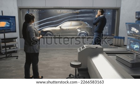 Engineers check aerodynamics of eco-friendly electric car in lab for modern modifications using wind tunnel with steam. Computer system for changing parameters. Car testing and technologies concept.