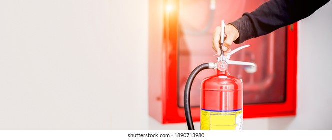 Engineers check the availability of fire extinguishers.