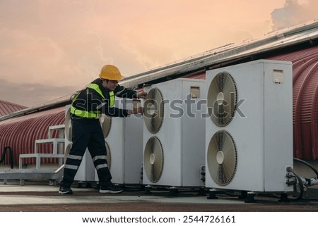 Engineers is checking the air conditioning cooling system of a major building or industrial facility.