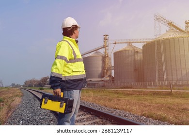 Engineers are checking the working system of a fresh food factory producing ducks, chickens and pork outside the building.