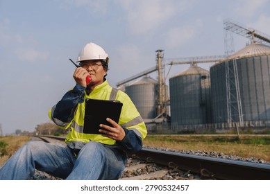 Engineers are checking the working system of a fresh food factory producing ducks, chickens and pork outside the building.