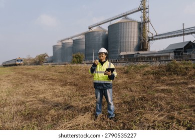Engineers are checking the working system of a fresh food factory producing ducks, chickens and pork outside the building.