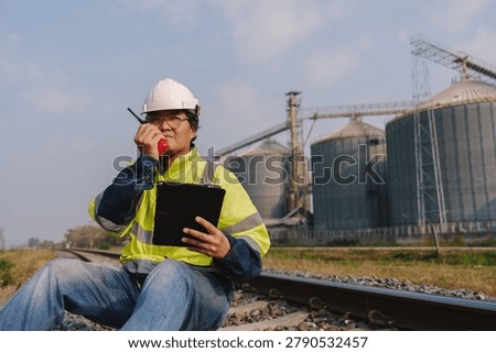 Engineers are checking the working system of a fresh food factory producing ducks, chickens and pork outside the building.