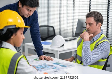 Engineers And Competent Employer Discussing Plans And Blueprints Together With Tablet In The Office. Concept Of Team Contribution Of Ideas For Engineering Project.