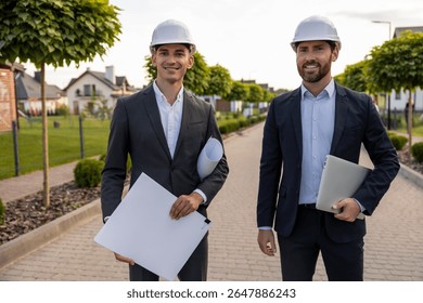 Engineers coordinating project with digital tools