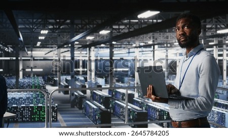 Engineers in data center using laptop to monitor neural network LLM visualization. Coworkers on server hub industrial platform overseeing server clusters powering machine learning processes,