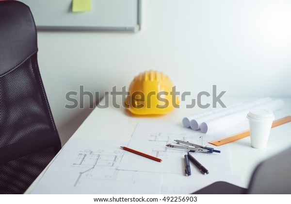Engineers equipment
on table, engineers
office
