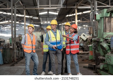 Engineers Meeting. Factory Worker People Walk And Check In Warehouse Factory. Manager Discuss Inspection Report For Internal Audit. Quality Assurance For Manufacturing. Concept Engineer Operating.