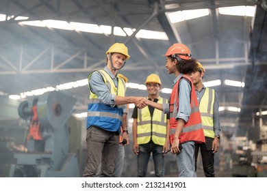 Engineers Meeting And Shaking Hand. Factory Worker People Walk And Check In Warehouse Factory. Manager Inspecting Internal Audit. Quality Assurance For Manufacturing. Concept Engineer Operating.