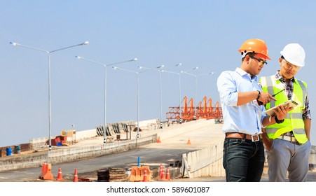 Engineers On Construction Sites, Road And Bridge.