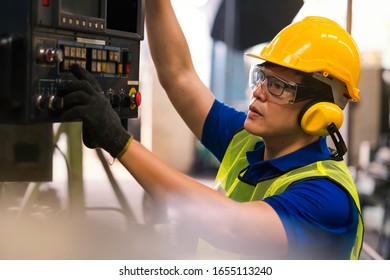 Engineers and skilled technicians control machines. Technicians and engineers are working of machinery in industrial plants.