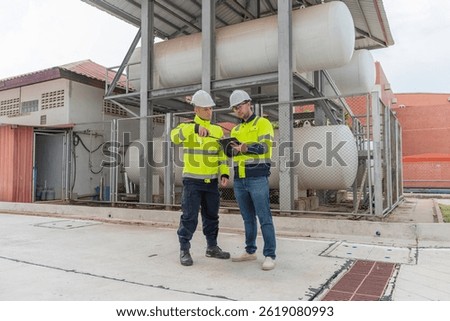 Engineers and supervisor work place to keep liquid helium,preventive maintenance schedule checking,Thailand people,Consult technical problems