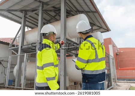Engineers and supervisor work place to keep liquid helium,preventive maintenance schedule checking,Thailand people,Consult technical problems