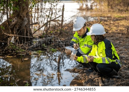 Engineers Testing Water Quality to Protect Environment from Pollution