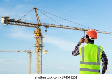 Engineers And Tower Crane.