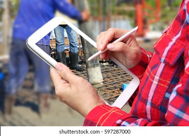 Engineers use the tablet. Background construction
