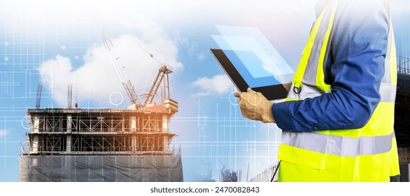 Engineers work on construction drawings and safety systems.,Building construction puts safety first.