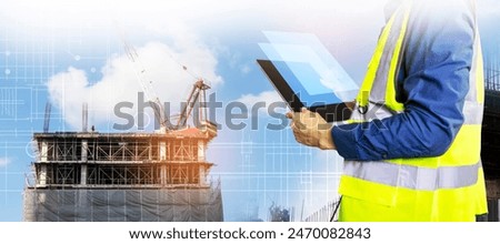 Engineers work on construction drawings and safety systems.,Building construction puts safety first.