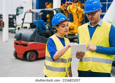 Engineers Working Inside Robotic Factory Industrial Stock Photo ...