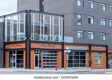 Englewood, Colorado / United States Of America - September 7 2019 : One Barrel American Bistro And Wine Bar.  Exterior With Outdoor Patio Seating.  Modern Wood Exterior With Metal And Glass.