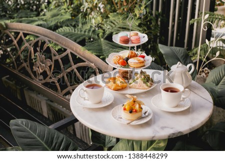 English afternoon high tea in the garden