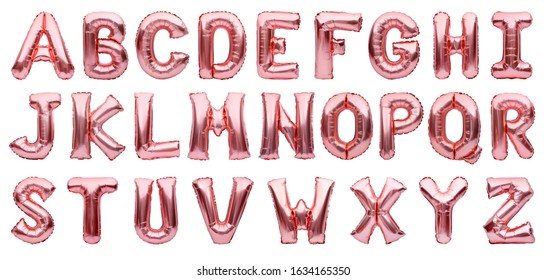 English Alphabet Made Of Rose Golden Inflatable Helium Balloons Isolated On White. Gold Pink Foil Balloon Font, Full Alphabet Set Of Upper Case Letters.