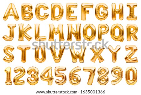 English alphabet and numbers made of golden inflatable helium balloons isolated on white. Gold foil balloon font, full alphabet set of upper case letters and numbers