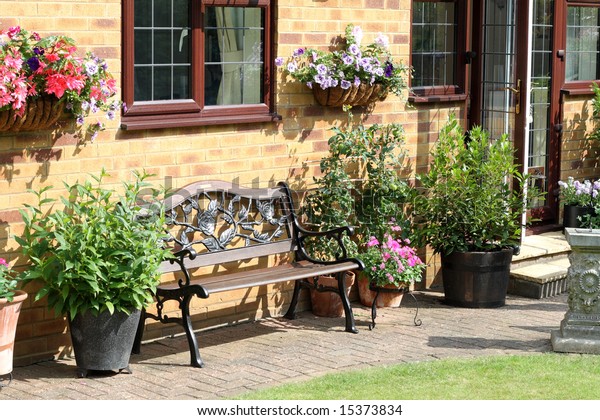 English Back Garden Bench Seat Flower Stock Photo (Edit Now) 15373834